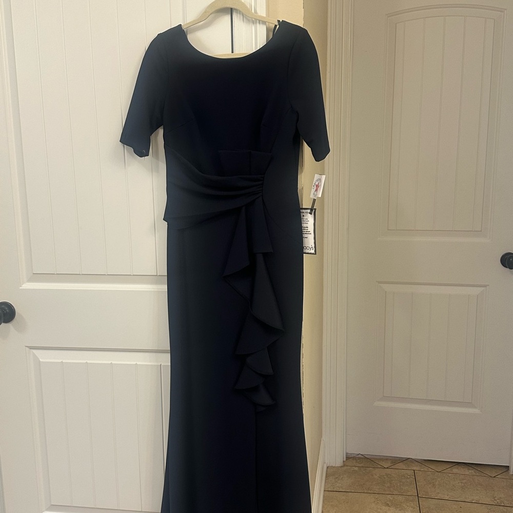 Betsy & Adam Elegant Navy Blue Gown with Ruffle Accent